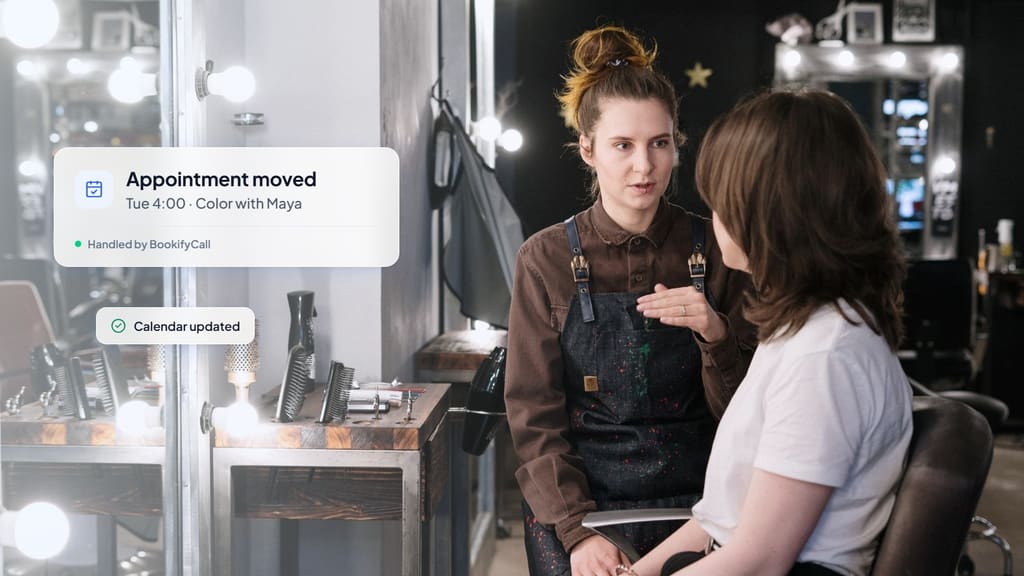 Hair stylist talking with a client at a salon chair, with a card showing an appointment moved to Tuesday at 4:00 and the calendar updated